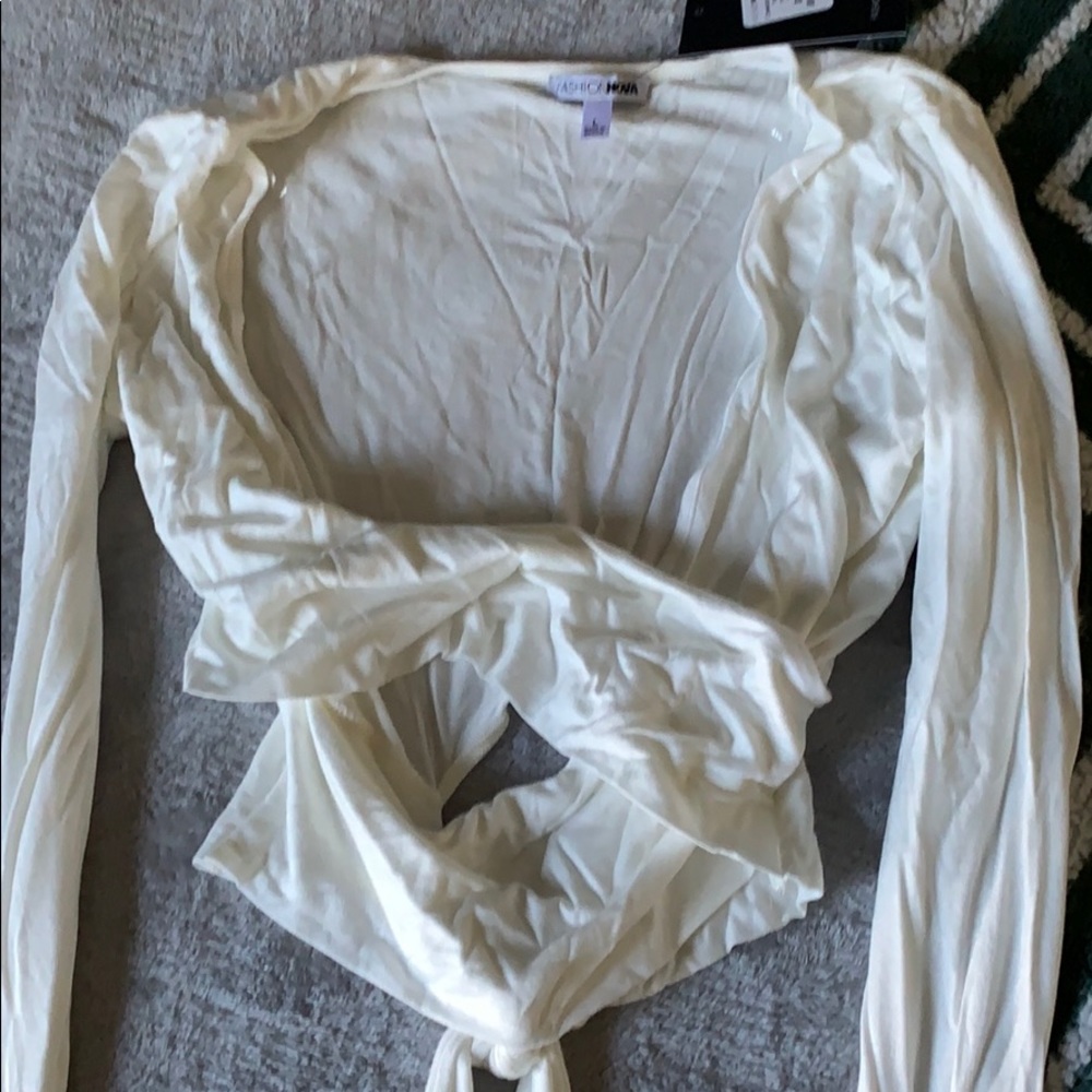 White long sleeve cross top from fashion nova